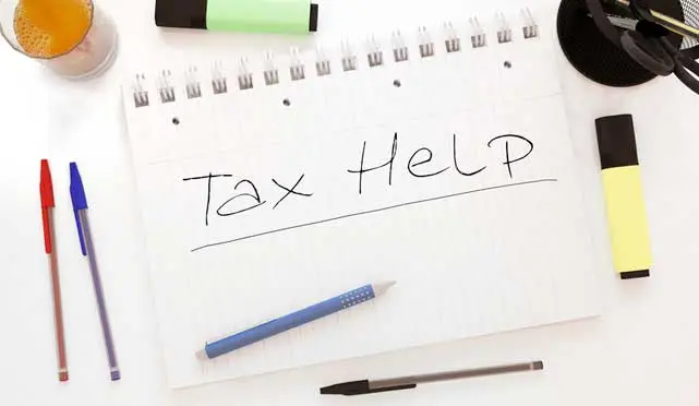 piece of paper with tax help written on