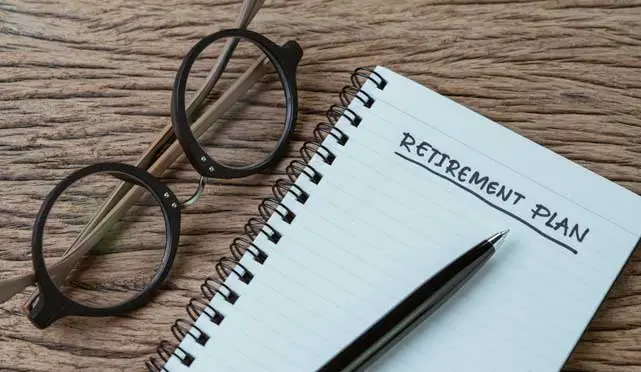 blank note book with the words retirement on