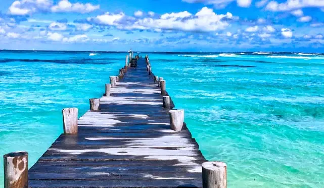 wooden pier over a blue sea